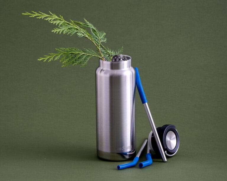 A Klean Kanteen TKWide bottle and stainless steel Straws that are now made with certified 90% post-consumer recycled 18/8 stainless steel.
